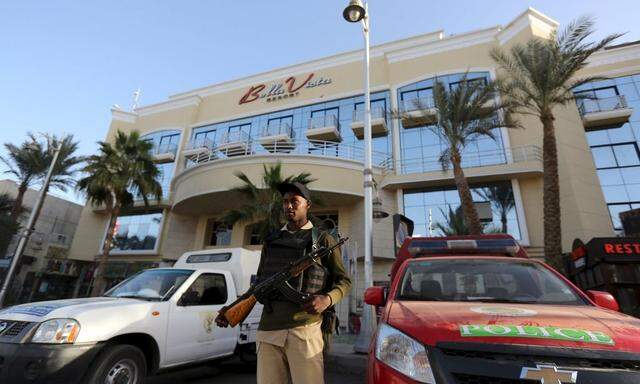 A member of the Egyptian security stands guard in front of the entrance to Bella Vista Hotel in Red Sea resort of Hurghada