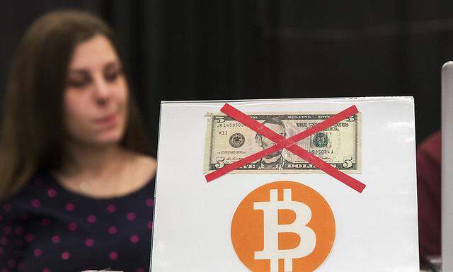 A Bitcoin themed sign stands on a desk during the Inside Bitcoins: The Future of Virtual Currency Conference in New York