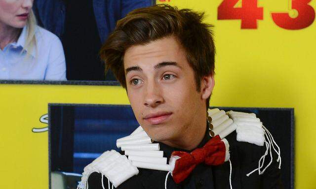 Actor Jimmy Bennett a cast member in the motion picture comedy Movie 43 attends the premiere of