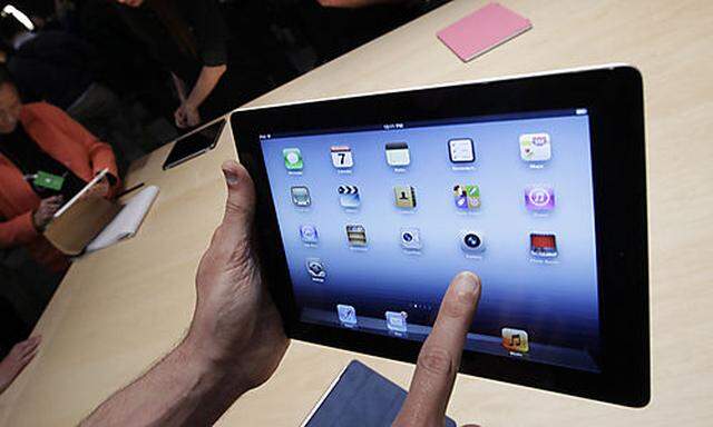 FILE - In this March 7, 2012 file photo, a new Apple iPad is on display during an Apple event in San 