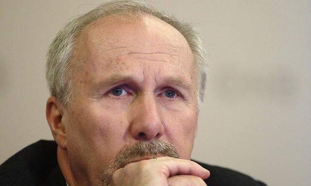 Austrian National Bank Governor Nowotny listens during a news conference in Vienna