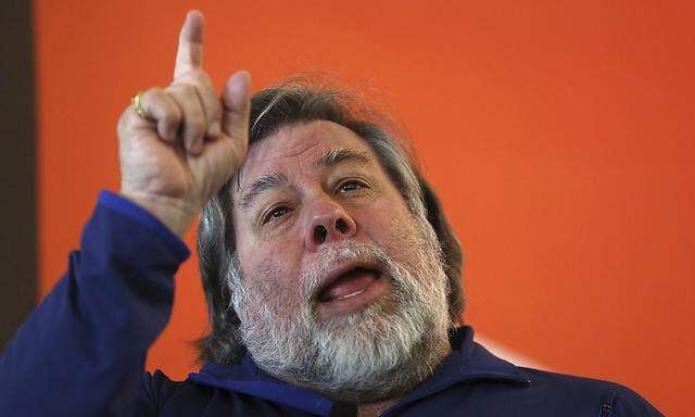 Apple co-founder Wozniak gestures during his keynote at Apps World in San Francisco