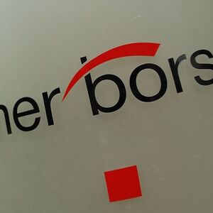 The Vienna Stock Exchange (Wiener Boerse) logo is displayed next to the company's street entrance in Vienna