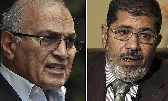 Combination of file photos of presidential candidates Shafiq and Mursi
