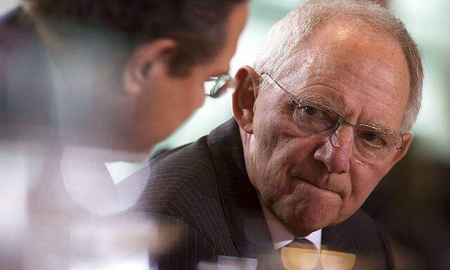 German Finance Minister Wolfgang Schaeuble attends cabinet meeting at Chancellery in Berlin