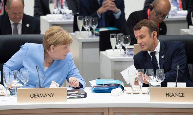 Angela Merkel und Emmanuel Macron loteten beim G20-Treffen in Osaka Lösungen für den EU-Personalstreit aus.