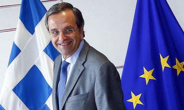 Greece´s Prime Minister Samaras arrives for a meeting with European Commission President Barroso at the EU Commission headquarters in Brussels