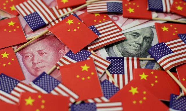 FILE PHOTO: Illustration picture showing U.S. dollar and China's yuan banknotes