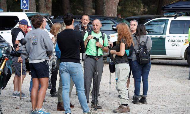 Family and relatives of missing Spanish Olympic medalist Blanca Fernandez Ochoa is seen at the site