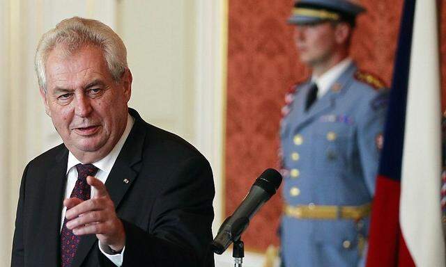 Czech President Milos Zeman gestures during the appointment ceremony of Jiri Rusnok as new prime minister at Prague Castle