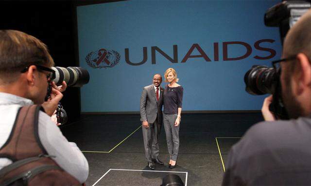 UNAIDS-Chef Michel Sidibé mit Charlize Theron.