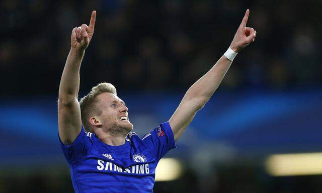 Chelsea´s Andre Schurrle celebrates after scoring a goal against Sporting during their Champions League soccer match in London