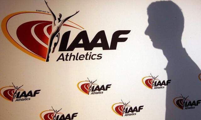 Man casts his shadow following press conference by IAAF's President Coe as part of 203nd IAAF council meeting in Monaco