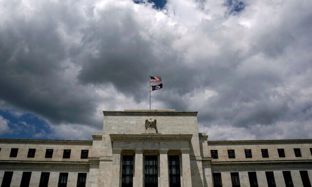 FILE PHOTO: FILE PHOTO: FILE PHOTO: Clouds over the Federal Reserve in Washington