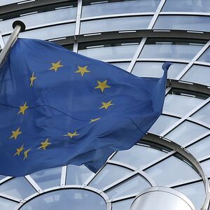 An European Union flag flutters outside of the European Parliament in Brussels