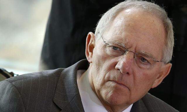 German Finance Minister Wolfgang Schaeuble attends a cabinet meeting at the Chancellery in Berlin