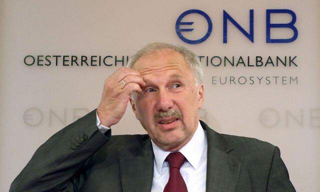Austrian National Bank Governor Nowotny prepares for the bank's 2015-2017 economic forecast news conference in Vienna