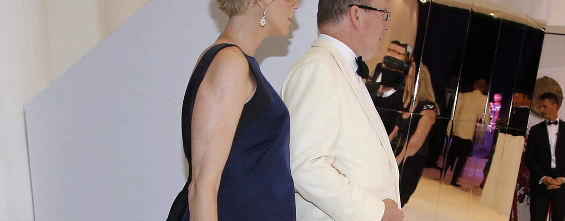 Prince Albert II of Monaco and his wife Princess Charlene arrive at the Red Cross Gala in Monte Carlo