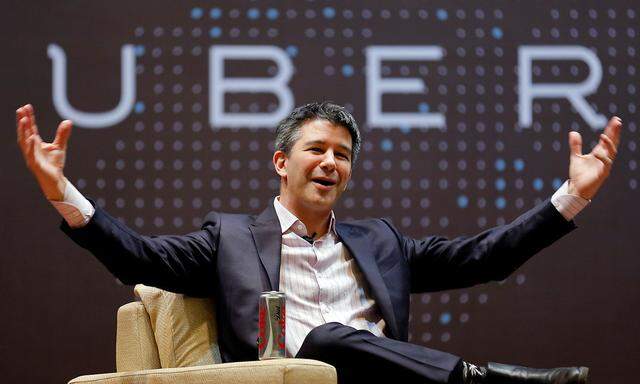 FILE PHOTO - Uber CEO Kalanick speaks to students during an interaction at IIT campus in Mumbai