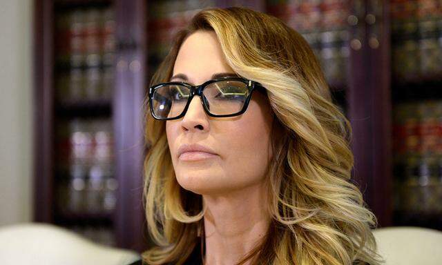 Jessica Drake speaks to reporters about allegations of sexual misconduct against Donald Trump, alongside lawyer Gloria Allred during a news conference in Los Angeles,