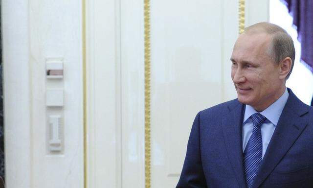 Russian President Vladimir Putin arrives for a meeting of the Security Council in Moscow's Kremlin