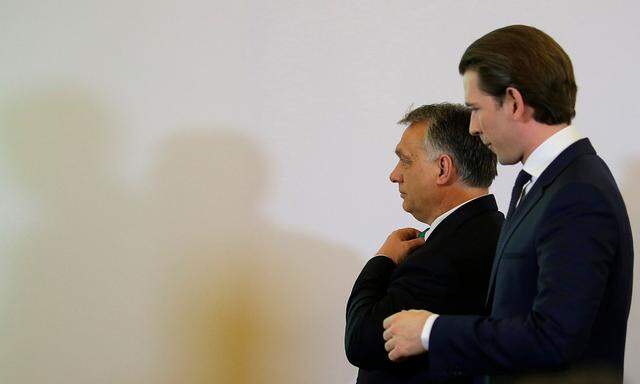 Hungary's Prime Minister Orban and Austria's Chancellor Kurz leave a news conference in the chancellery in Vienna