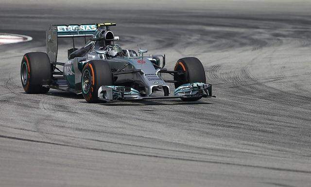 Mercedes Formula One driver Rosberg of Germany takes a corner during the first practice session of the Malaysian F1 Grand Prix at Sepang International Circuit outside Kuala Lumpur