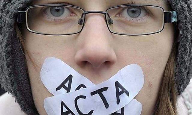 Demonstrators protest against signing of the international copyright agreement ACTA by the Slovenian 
