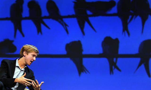 Chris Hughes, co-founder of Facebook, speaks during the Charles Schwab IMPACT 2010 conference in Boston