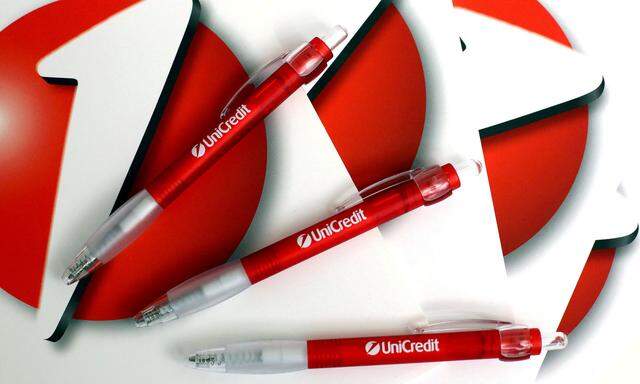 FILE PHOTO: Unicredit's bank logo is pictured on block notes and pens at the headquarters in Milan