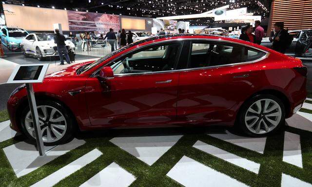 A TESLA Model 3 is shown at the Los Angeles Auto Show