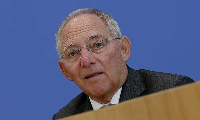 German Finance Minister Schaeuble addresses a news conference to presents 2014 federal budget bill  in Berlin