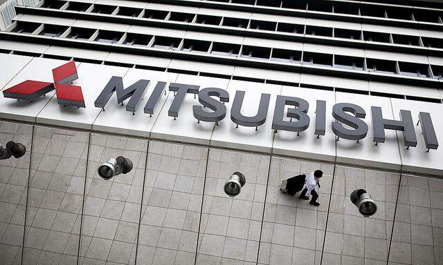 The company logo of Mitsubishi Motors is seen at it's headquarters in Tokyo