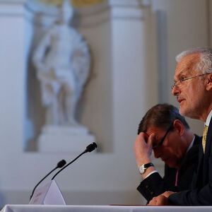 Austrian Justice Minister Josef Moser and Secretary General Christian Pilnacek attend a news conference in Vienna