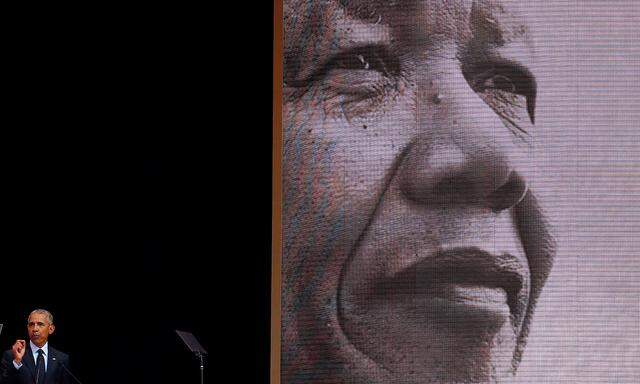 Former U.S. President Barack Obama delivers the 16th Nelson Mandela annual lecture, marking the centenary of the anti-apartheid leader´s birth, in Johannesburg