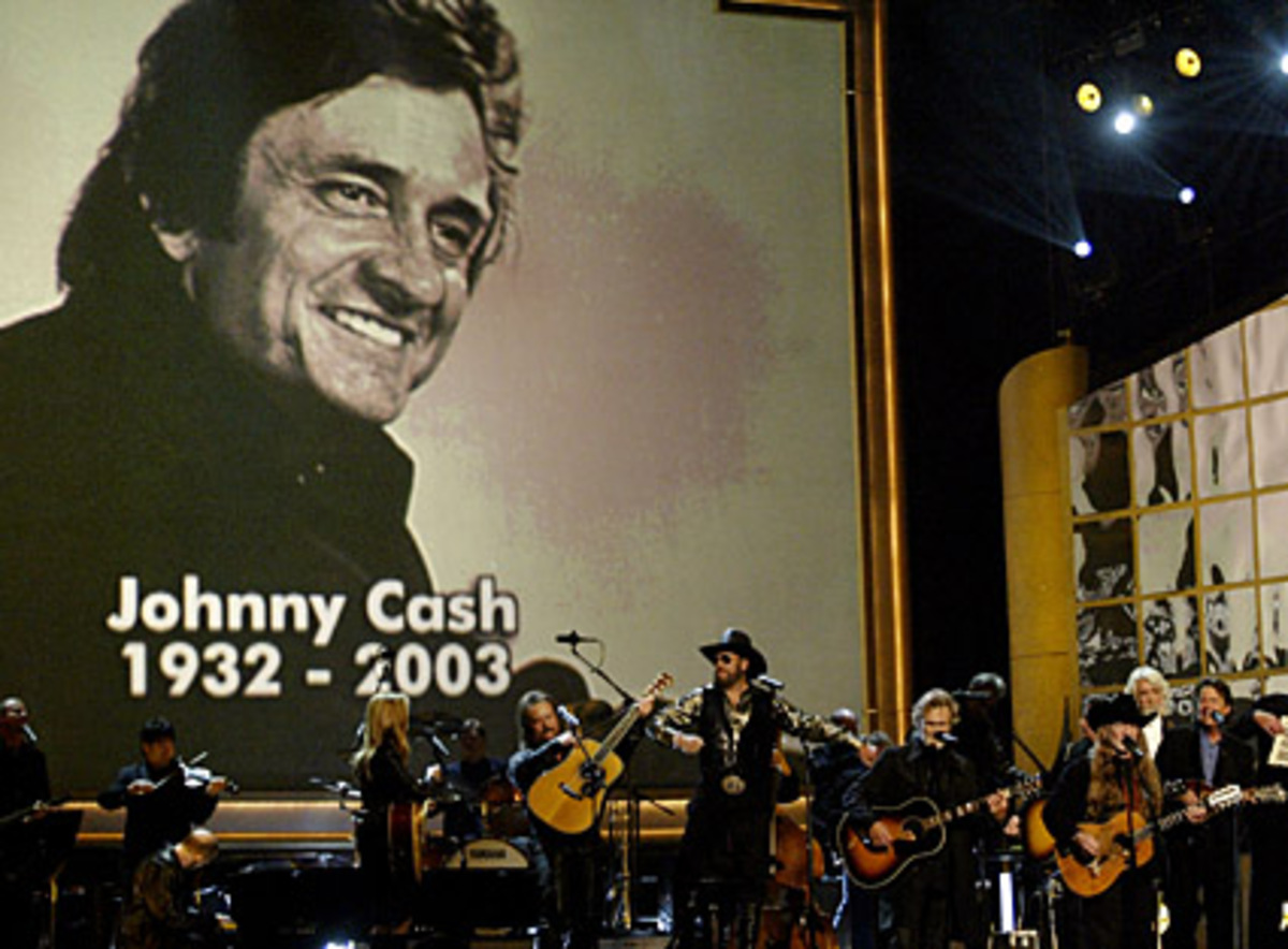 Zusammen mit Elvis Presley, Jerry Lee Lewis und Carl Perkins schuf er den Rockabilly, eine Synthese aus harter Country Music und Rythm and Blues. In den 60er Jahren war er mit seinen Songs, in denen er sich für die Unterprivilegierten einsetzte, der erste zornig-kritische Country-Sänger.