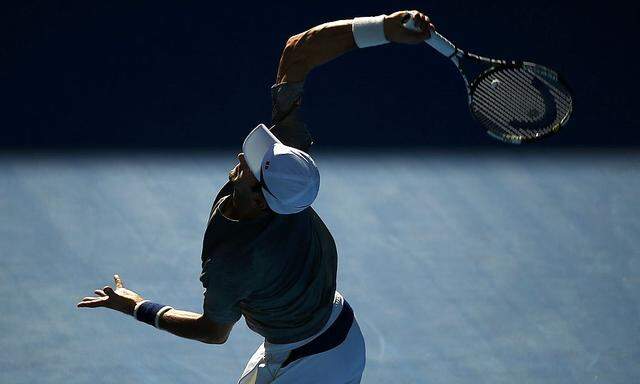 Serbia's Djokovic serves during a practice session at Melbourne Park, Australia