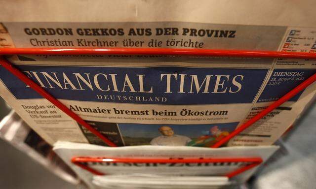 An edition of the Financial Times Deutschland (Germany) is seen at a shop in Frankfurt