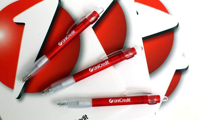 Unicredit´s bank logo is pictured on block notes and pens at the headquarters in Milan