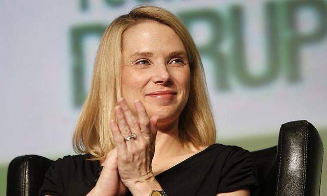 File photo of Yahoo CEO Marissa Mayer claps during TechCrunch Disrupt SF 2012 in San Francisco