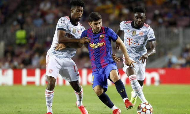 Barcelona, Spain, September 14th 2021: Kingsley Coman (11 Bayern Munchen) and Yusuf Demir (11 FC Barcelona, Barca during