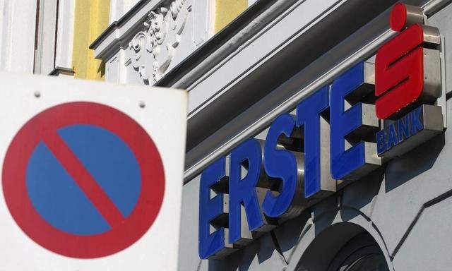 The logo of Erste Group Bank is pictured behind a traffic sign at a branch office in Vienna