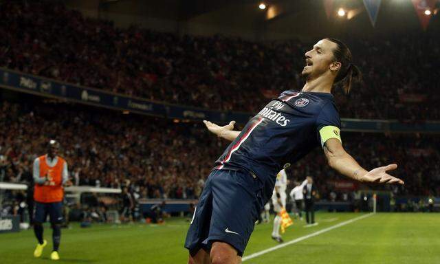 Paris St Germain's Zlatan Ibrahimovic celebrates after scoring a goal against St Etienne during their French Ligue 1 soccer match at the Parc des Princes Stadium in Paris