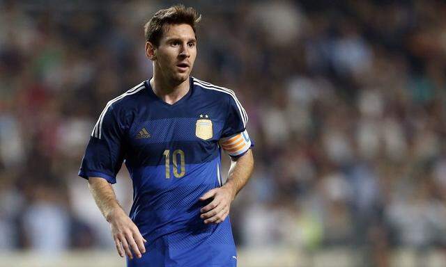 Argentina's Lionel Messi reacts during their international friendly soccer match against Hong Kong in Hong Kong