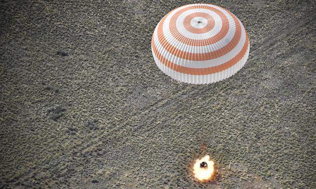 The Soyuz MS-11 capsule carrying the International Space Station (ISS) crew of NASA astronaut Anne McClain, Russian cosmonaut Oleg Kononenko and David Saint-Jacques of the Canadian Space Agency, lands in a remote area outside the town of Dzhezkazgan