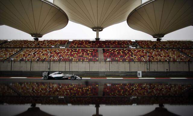 Mercedes Formula One driver Lewis Hamilton of Britain drives during the first practice session of the Chinese F1 Grand Prix at the Shanghai International circuit