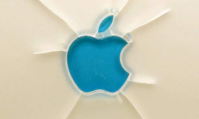 A broken Apple logo is seen during the ´History of Computers´ exhibition in Sarajevo