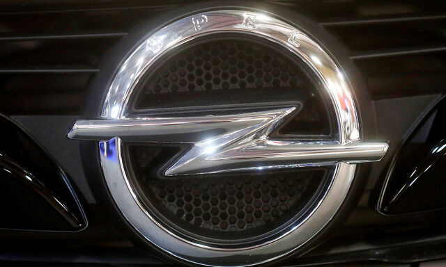 FILE PHOTO: An Opel badge on a car at a motor show in Riga