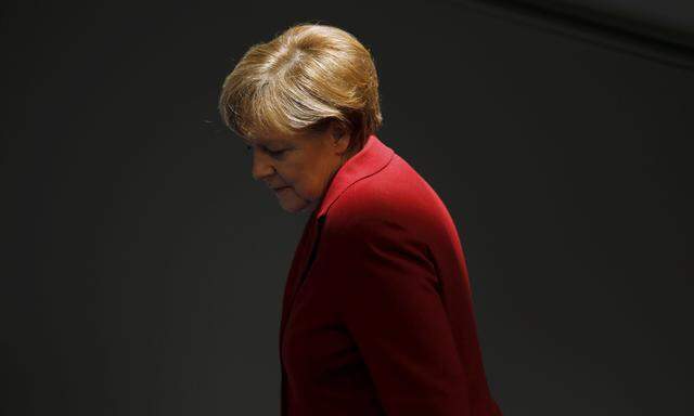 File photo of German Chancellor Merkel attending a debate at Bundestag in Berlin