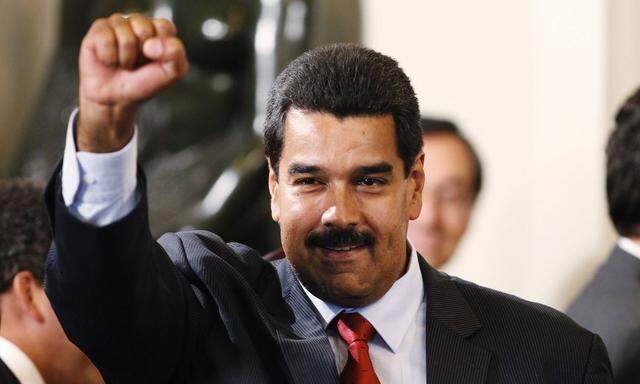 Venezuela's President-elect Maduro gestures after a meeting with presidents of the Unasur regional group in Lima